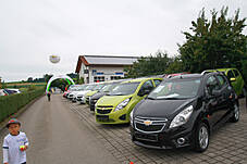 Plakat im Festzelt, der Chevrolet Orlando

Die 3 Z`widern mit viertem Mann

Früh übt sich wer ein Rennfahrer werden will

aber sich für ein Auto zu entscheiden ist schwer

Fuhrpark der KFZ-Mayer in Mauerham

Fuhrpark der KFZ-Mayer in Mauerham

Fuhrpark der KFZ-Mayer in Mauerham

Der Parkplatz war trotz des schlechten Wetters vollgeparkt

Der Parkplatz war trotz des schlechten Wetters vollgeparkt

Fuhrpark der KFZ-Mayer in Mauerham

Plakate im alten und neuem Chevrolet-Design

Hildegard Mayer beim Systemmarketing Stand

Von den Süßigkeiten war am Ende nichts mehr über

Die Technik vom Systemmarketing Stand ist vorbereitet

Firma Systemmarketing gratuliert zu 20 Jahren KFZ Mayer, mit Blumen...

... und einer großen Flasche Bier

Gar nicht so leicht sie loszulassen

Blumenstrauß und Bier - so gratulieren wir: Systemmarketing GmbH

Gruppenfoto Hildegard und Michael Mayer mit dem Team der Systemmarketing GmbH und Verena

99 Luftballons, aber sie fliegen noch nicht am Horizont

Links Hindernissparcours für die Rauschbrille und geradeaus das Festzelt

CardioZone & Adventuressport

Adventure-Sport Stand 

Die Neuwagenausstellung im Keller war eine Besichtigung wert

Die 3 Z`widern

Die Belegschaft von KFZ-Mayer zur allgemeinen Begrüßung auf der Bühne

Die Belegschaft von KFZ-Mayer zur allgemeinen Begrüßung auf der Bühne

Der Systemmarketing Stand war gut besucht

Der Systemmarketing Stand war gut besucht

Herr Steiner erhielt zum 60. Geburtstag ein Präsent von KFZ-Mayer

und von der Systemmarketing GmbH einen Gutschein für ein Wellness-Wochenende

KFZ-Mayer und Systemmarketing GmbH wünschten dem Geburtstagskind alles Gute

Das Fest war gut besucht

Noch schnell mal einen Soundcheck

Die Band von Claudia Koreck steht schon bereit

Claudia Koreck und Band sorgten für Stimmung im Festzelt

Claudia Koreck und Band sorgten für Stimmung im Festzelt

Claudia Koreck und Band sorgten für Stimmung im Festzelt

Das ganze Zelt war voll

Nebst interessierten, auch desinteressierte Gesichter

Claudia Koreck und Band

Claudia Koreck und Band

Nach dem Konzert eine kleine Ansprache von Hans Mayer

Ein Dank an die Familie Graewert und Koreck für gute Zusammenarbeit

Blumen für die Damen, Rucksäcke für die Herren und das BobbyCar für den Nachwuchs

Kurze Worte von Moderator Hans Mayer

Die 3 Z`widern

Die 3 Z`widern

Vor der Preisverteilung wurde der 1. Preis ins Festzelt gefahren

Kurze Worte zum Ablauf und begrüßung der Notare

Ehrung der 1. Kunden die ein ganzes Auto gekauft haben

Diese 2 haben richtig geschätzt wieviele Bälle im Chevrolet Orlando waren: 138 Stück

Glücksfee Verena darf gleich die Lose ziehen

Michael Mayer auf der Bühne

Ein paar Worte vom Notar zur Verlosung

Michael Mayer liest gleich die gezogenen Nummern vor

Mitarbeiter von KFZ-Mayer holen jeweils die Preise aus dem Auto

Ablauf einer Glücksfee: Nummer ziehen und dem Notar zeigen

Warten auf den Gewinner

Michael und Hans Mayer hatten viel Spaß bei der Moderation

Obligatorischer Nummern-Vergleich und notieren der Adresse der Gewinner/in

Schön weggucken und ne neue Nummer ziehen

Nummer zum vorlesen überreichen

Blumenschmuck auf der Bühne

Blumenschmuck auf der Bühne

Warten auf die neue Ziehung: Beide Notare, Hildegard Mayer und Glücksfee Verena

Insgesamt gab es 30 Preise zu gewinnen

Kurze Erfrischung auf der Bühne

Und weiter im Programm

Die Besucher im Zelt warten schon gespannt auf die nächste Nummer

Langsam nähern wir uns dem Ende

Insgesamt gab es mehr weibliche als männliche Gewinner

Nächster Preis: Rucksäcke mit Inhalt

Nummernvergleich beim Notar und gleich danch erhält der Gewinner seinen Picknickkorb

Michael Mayer bei der nächsten Nummer

Und wieder ein Gewinner

Wer im Zelt keinen Platz mehr hatte stand vorm Eingang

Prost

Prost

Spannung pur

Kleine Pause mit einer Darbietung von den 3 Z`widern

das nächste Los

Warten auf den Gewinner

Wer sich wohl meldet

Gespannte Gesichter

Durch eine kurzfristige Spende gabs zwei zweite Preise

Der 1. zweite Preis ein Gutschein für ein Wellness Wochenende

Ziehung des 2. zweiten Preises

Nummernübergabe

Der 2. zweite Preis war ein Rundflug mit dem Xcitor 

Ums spannend zu machen: Pause vorm großen Finale

Instruktionen an die Glücksfee

Applaus an die 3 Z´widern

Schön weggucken beim Gewinnerlos

Dem Notar zur Ansicht zeigen

Alles in Ordnung, jetzt kanns gleich verlesen werden

So, wer ist wohl der glückliche Gewinner?

Blick in die Runde wo der Gewinner auftaucht.

Kurzes Warten auf den Gewinner

Foto mit dem Gewinner des Chevrolet Sparks mit Michael und Hildegard Mayer und Glücksfee Verena

Nach der Verlosung wurde das Zelt schnell leerer

Das Wort geht an den Herrn Notar

Abschließende Worte von Moderator Hans Mayer

Begutachtung des Gewinns

Probesitzen

Wie sich unser Gewinner jetzt wohl fühlt !?

Der Tag danach - soviele Geschenke gab es

Was für ein Wetter - das hätte man gestern haben müssen

Fuhrpark im Sonnenschein

Vereinzelt stehen noch Autos auf dem Parkplatz

Wir bedanken uns bei allen Besuchern - es war ein tolles Fest